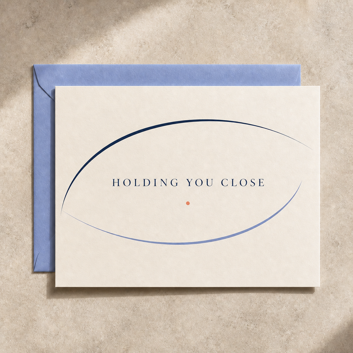 Holding You Close sympathy card styled with a periwinkle envelope
