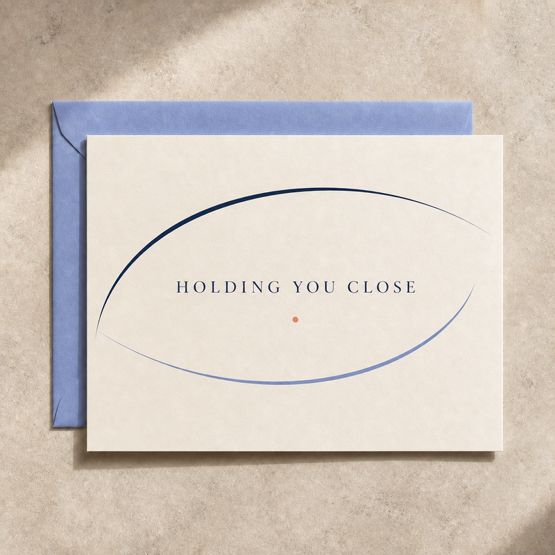 Holding You Close sympathy card styled with a periwinkle envelope