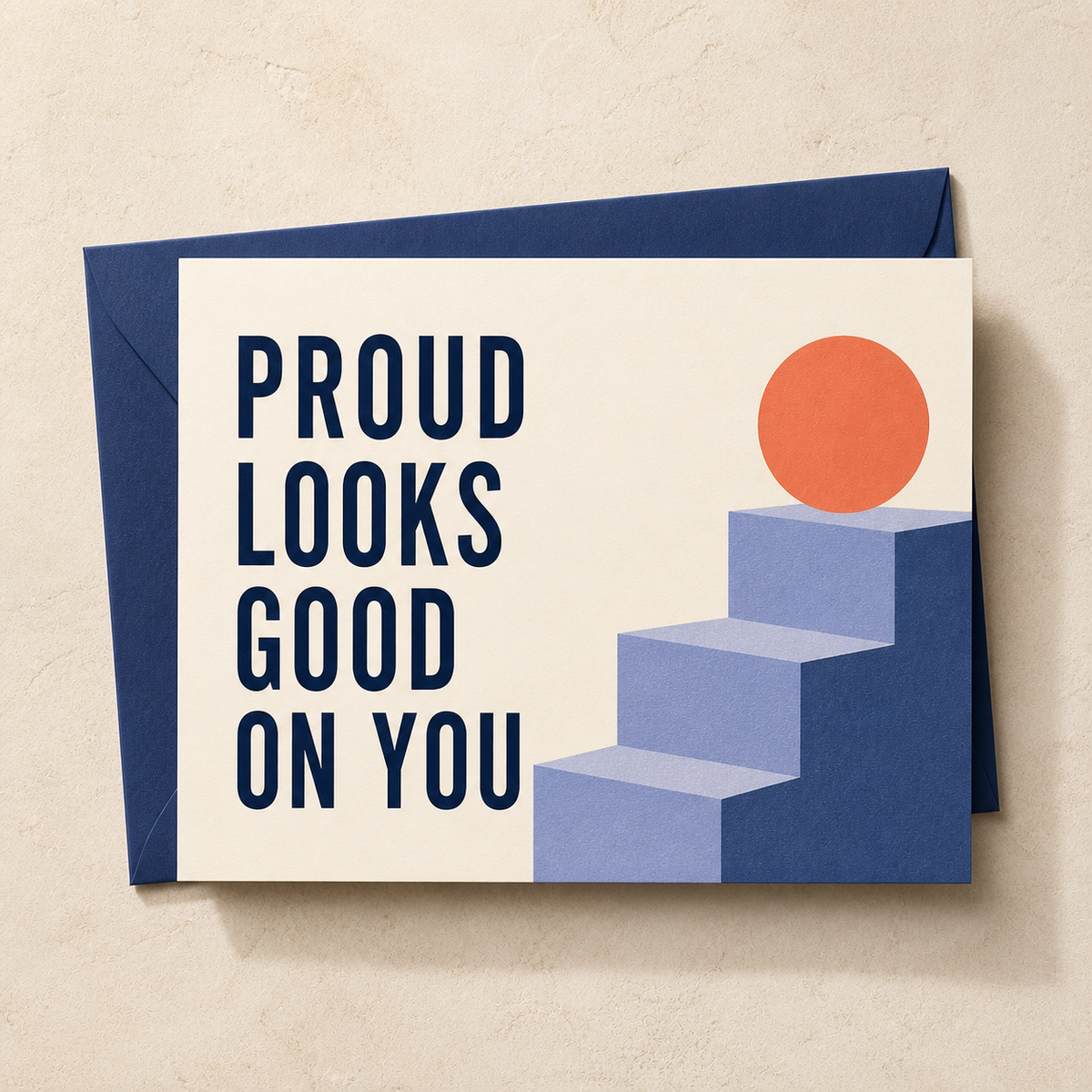 Proud Looks Good on You congratulations card styled with a navy envelope