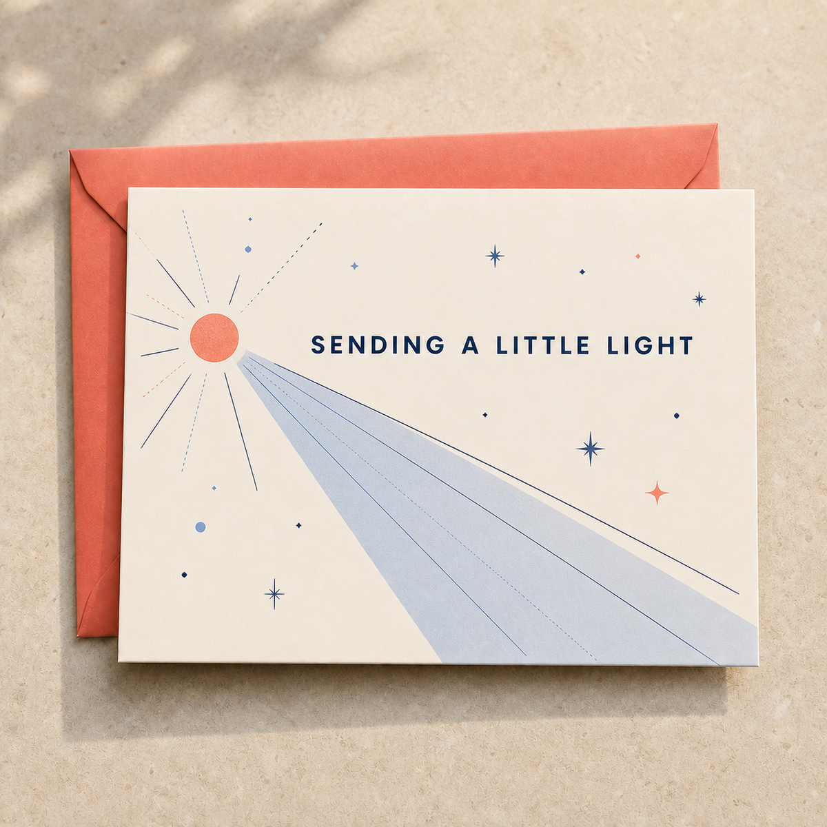 Sending a Little Light thinking of you card styled with a coral envelope