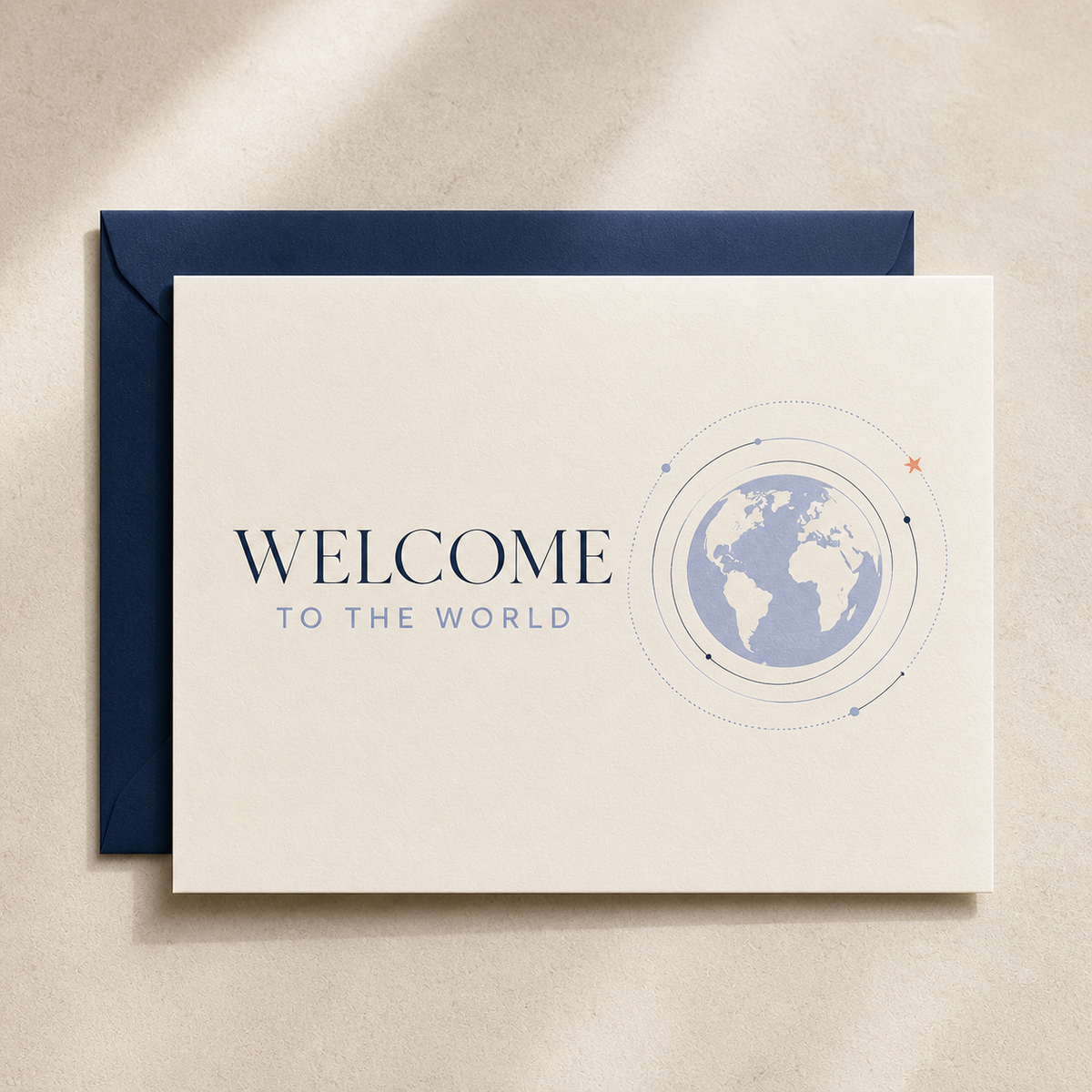 Welcome to the World new baby card styled with a navy envelope