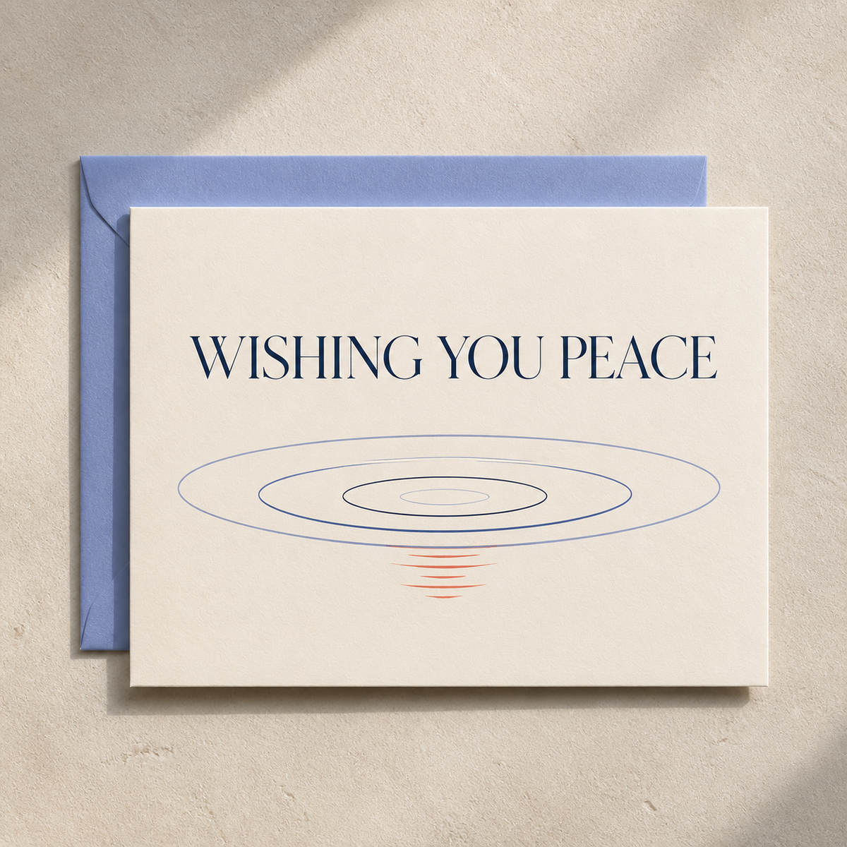 Wishing You Peace sympathy card styled with a periwinkle envelope